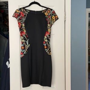 Macy’s black mini body con dress